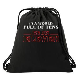 In A World Full Of Tens Be An Eleven Drawstring Bag