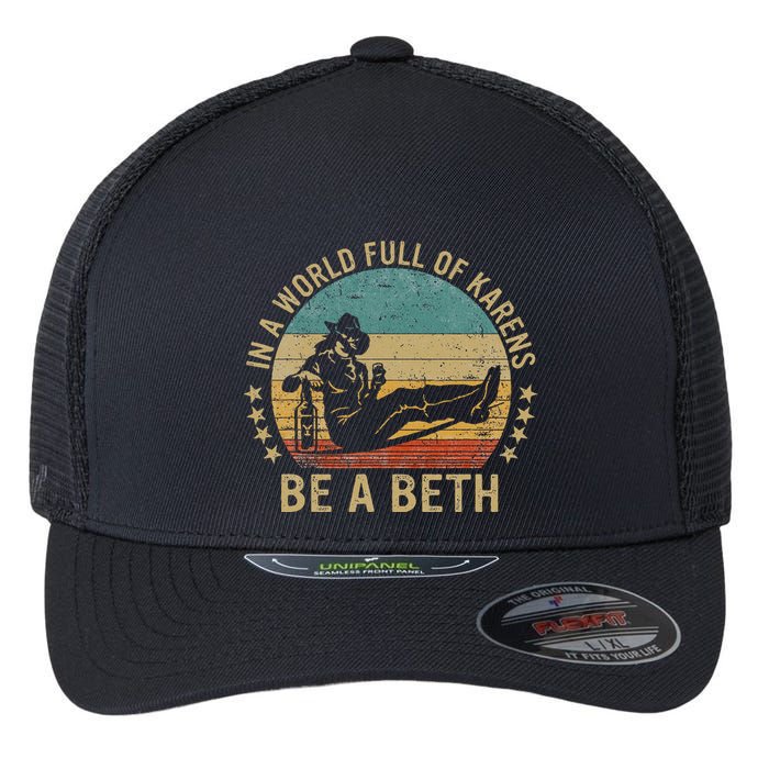 In A World Full Of Karens Be A Beth Flexfit Unipanel Trucker Cap