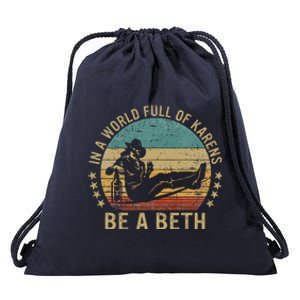 In A World Full Of Karens Be A Beth Drawstring Bag