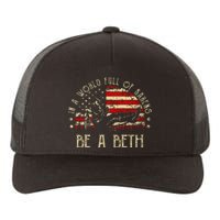 In A World Full Of Karens Be A Beth Usa Flag Yupoong Adult 5-Panel Trucker Hat