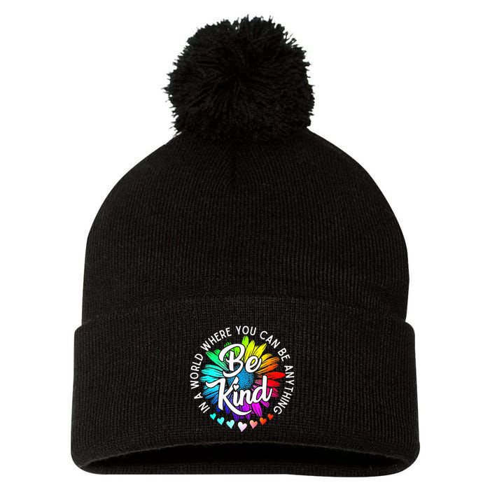 In A World Where You Can Be Anything Be Kind Rainbow Flower Pom Pom 12in Knit Beanie