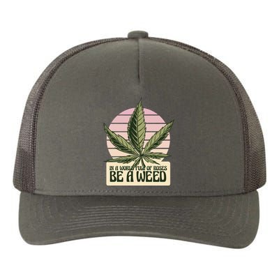 In A World Full Of Roses Be A Weed Funny Yupoong Adult 5-Panel Trucker Hat