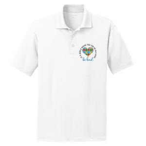 In A World Where You Can Be Anything Be Kind Autism Awareness PosiCharge RacerMesh Polo