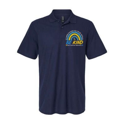 In A World Where You Can Be Anything Be Kind Down Syndrome Awareness Blue Yellow Softstyle Adult Sport Polo