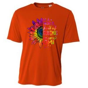 In A World Full Of Grandmas Be Omi Sunflower Christmas Gift Cooling Performance Crew T-Shirt