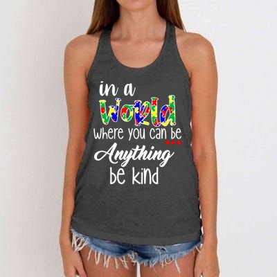 In A World Where You Can Be Anything Be Kind Autism Awareness Women's Knotted Racerback Tank