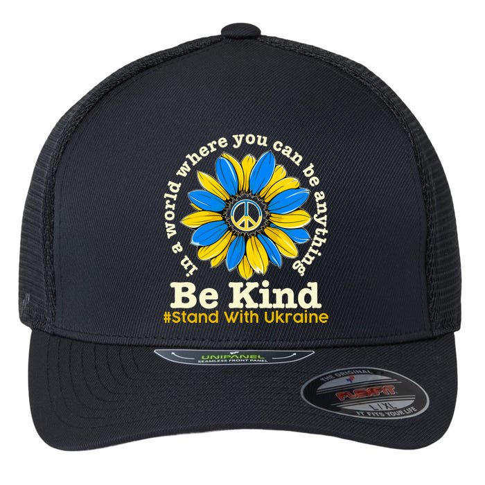 In A World Where You Can Be Anything Be Kind # Stand With Ukraine Flexfit Unipanel Trucker Cap