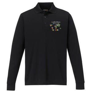 In A World Where You An Be Anything Be Kind Autism Awareness Puzzle Performance Long Sleeve Polo