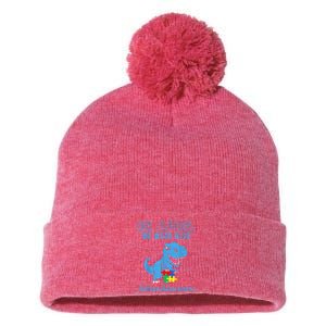 In April We Wear Blue Autism Awareness Month Dinosaur Pom Pom 12in Knit Beanie