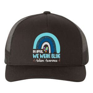 In April We Wear Blue Rainbow Autism Puzzle Yupoong Adult 5-Panel Trucker Hat