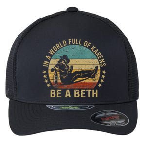 In A World Full Of Karens Be A Beth Flexfit Unipanel Trucker Cap