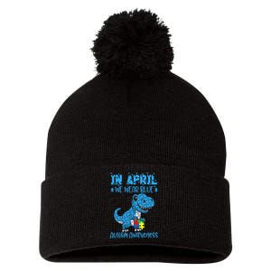 In April We Wear Blue Autism Awareness Month Dinosaur Trex Pom Pom 12in Knit Beanie