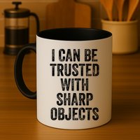 I Can Be Trusted With Sharp Objects Sarcastic Saying Mug