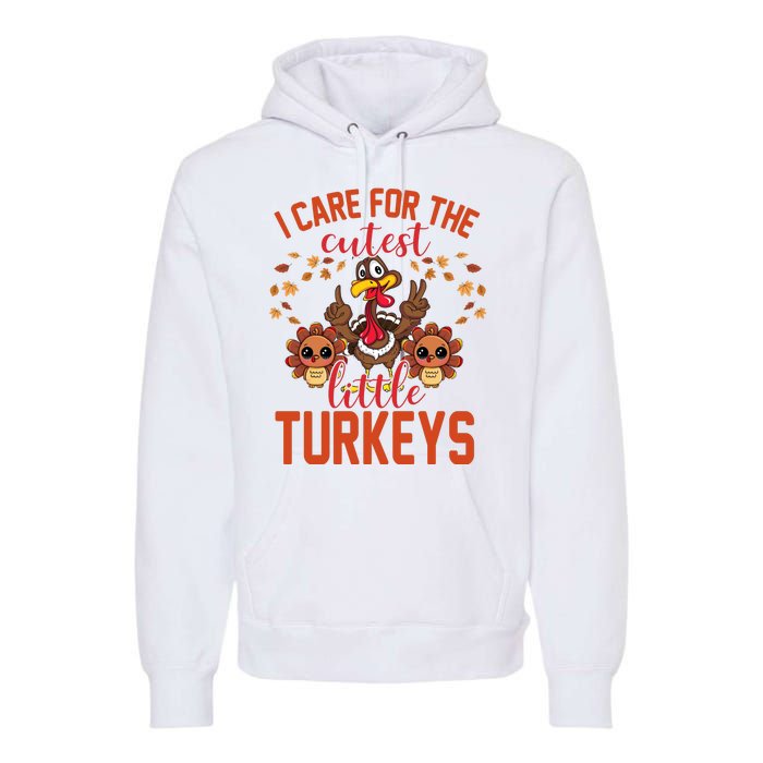 I Care For The Cutest Little Turkeys Thanksgiving Teacher Premium Hoodie