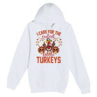 I Care For The Cutest Little Turkeys Thanksgiving Teacher Premium Pullover Hoodie