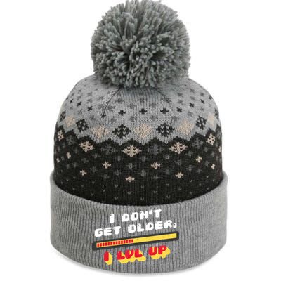 I Dont Get Older I Level Up Gift The Baniff Cuffed Pom Beanie