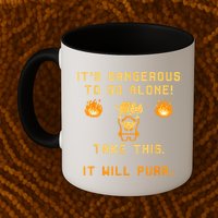 ITS DANGEROUS TO GO ALONE! TAKE THIS. IT WILL PURR Mug