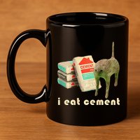 I Eat Cement Cursed Cat Unhinged Funny Meme On Back 11oz C Handle Ceramic Mug