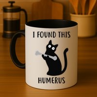 I Found This Humerus Funny Black Cat Mug