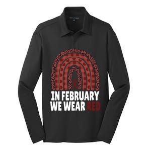 In February We Wear Red Heart Health Disease Awareness Month Cute Gift Silk Touch Performance Long Sleeve Polo