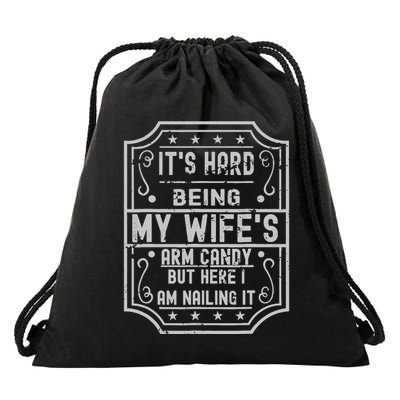 Its Hard Being My Wifes Arm Candy Here I Am Nailing It Drawstring Bag