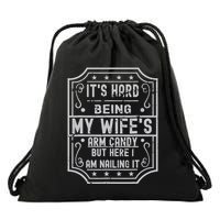 Its Hard Being My Wifes Arm Candy Here I Am Nailing It Drawstring Bag