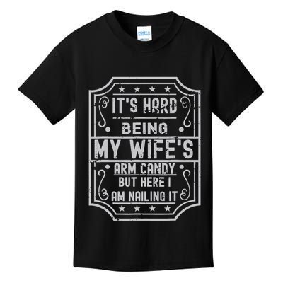 Its Hard Being My Wifes Arm Candy Here I Am Nailing It Kids T-Shirt
