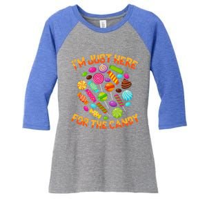 Im Just Here For The Candy Funny Halloween Pun Women's Tri-Blend 3/4-Sleeve Raglan Shirt