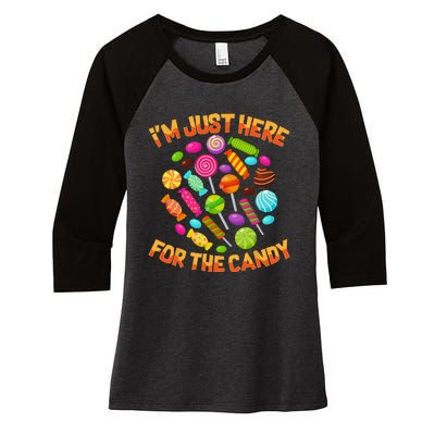 Im Just Here For The Candy Funny Halloween Pun Women's Tri-Blend 3/4-Sleeve Raglan Shirt