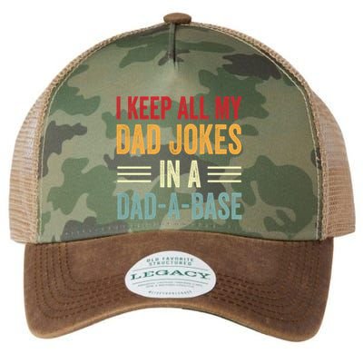 I Keep All My Dad Jokes In A Dad A Base Legacy Tie Dye Trucker Hat