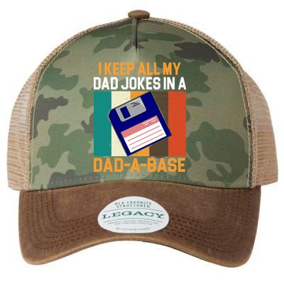 I Keep All My Dad Jokes In A Dad A Base Vintage Funny Legacy Tie Dye Trucker Hat