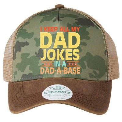 I Keep All My Dad Jokes In A Dad A Base Dad Jokes Vintage Legacy Tie Dye Trucker Hat