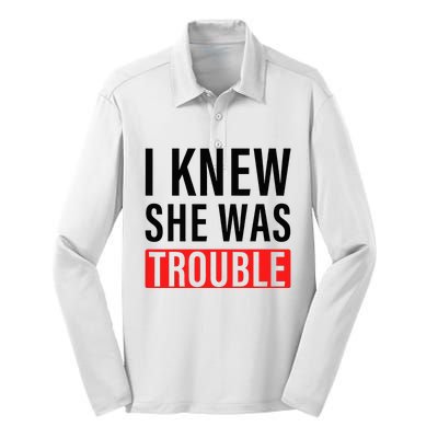 I Knew She Was Trouble Silk Touch Performance Long Sleeve Polo