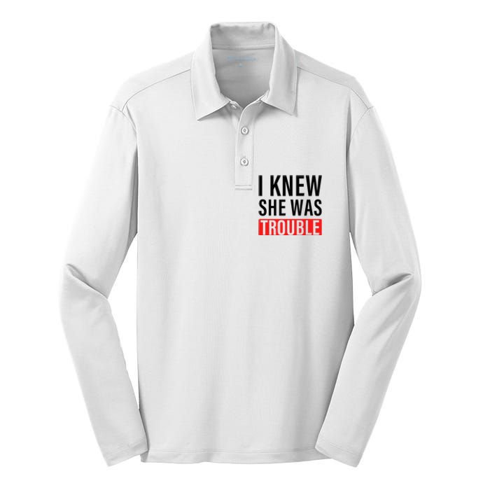 I Knew She Was Trouble Silk Touch Performance Long Sleeve Polo