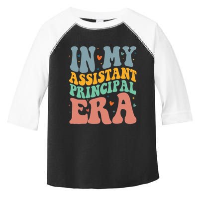 In My Assistant Principal Era Groovy Toddler Fine Jersey T-Shirt