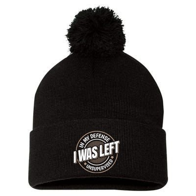 In My Defense I Was Left Unsupervised Funny Saying Graphic Pom Pom 12in Knit Beanie