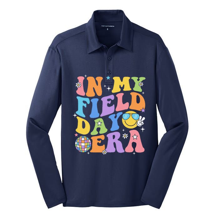 In My Field Day Era Teacher Funny Field Day 2024 Silk Touch Performance Long Sleeve Polo