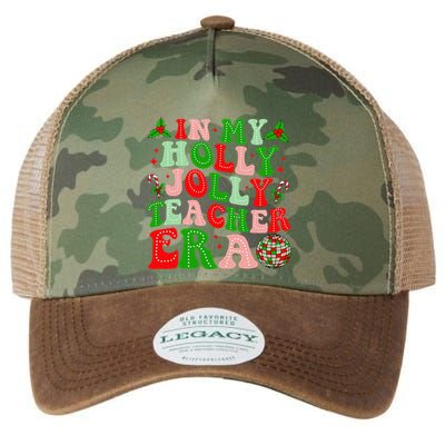 In My Holly Xmas Jolly Teacher Era Teacher Christmas Vibes Legacy Tie Dye Trucker Hat