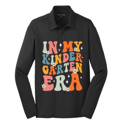 In My Kindergarten Era Groovy Back To School Kinder Teacher Silk Touch Performance Long Sleeve Polo