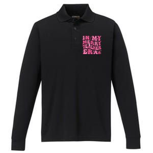 In My Merry Teacher Era Groovy Pink Christmas Teacher Gift Performance Long Sleeve Polo