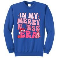 In My Merry Nurse Era Retro Groovy Wavy Pink Santa Hat Xmas Cute Gift Sweatshirt