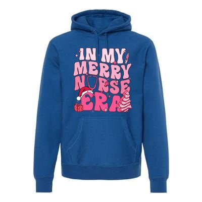 In My Merry Nurse Era Retro Groovy Wavy Pink Santa Hat Xmas Cute Gift Premium Hoodie