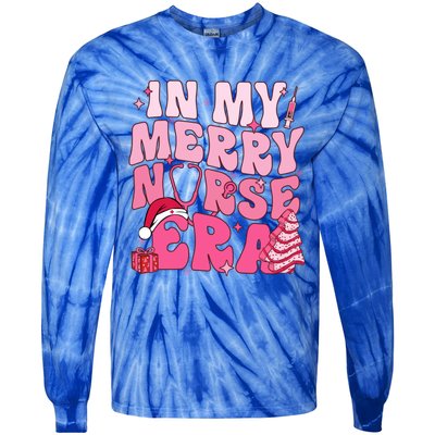 In My Merry Nurse Era Retro Groovy Wavy Pink Santa Hat Xmas Cute Gift Tie-Dye Long Sleeve Shirt