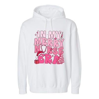 In My Merry Nurse Era Retro Groovy Wavy Pink Santa Hat Xmas Cute Gift Garment-Dyed Fleece Hoodie