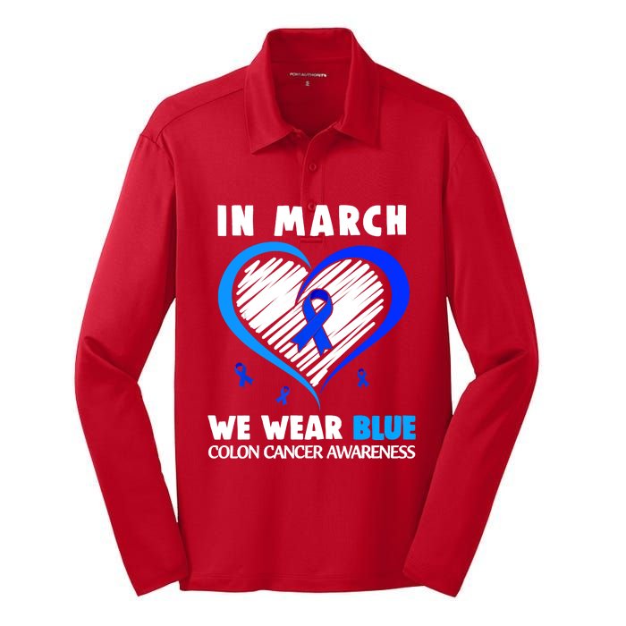 In March We Wear Blue For Colon Cancer Awareness Blue Heart Silk Touch Performance Long Sleeve Polo