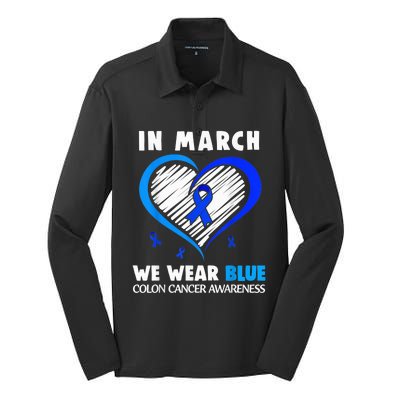 In March We Wear Blue For Colon Cancer Awareness Blue Heart Silk Touch Performance Long Sleeve Polo