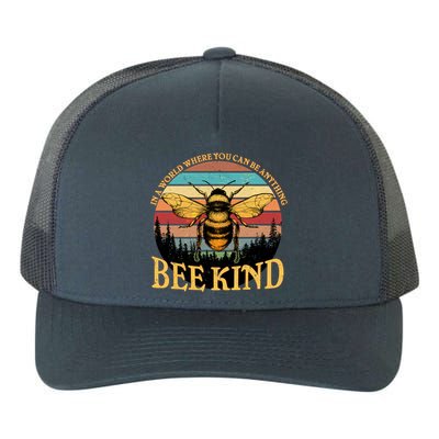 In A World Where You Can Be Anything Bee Kind Yupoong Adult 5-Panel Trucker Hat