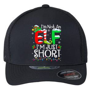 IM Not An Elf IM Just Short Funny Christmas Family Pajamas Flexfit Unipanel Trucker Cap