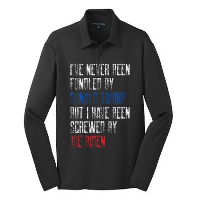 I’Ve Never Been Fondled By Donald Trump But Screwed By Biden Silk Touch Performance Long Sleeve Polo