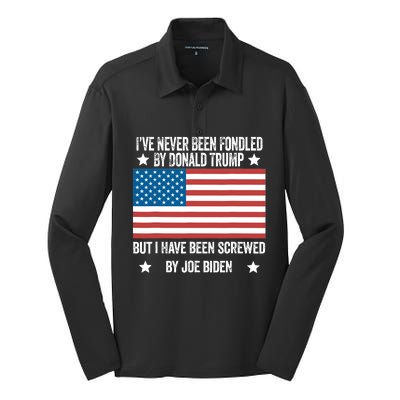 I’Ve Never Been Fondled By Donald Trump But Screwed By Biden Silk Touch Performance Long Sleeve Polo